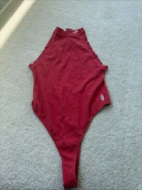 FP MOVEMENT High-Neck One-Piece Bodysuit in Berry Red